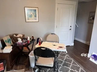 Before: the studio from the doorway, crowded with a folding table and chairs